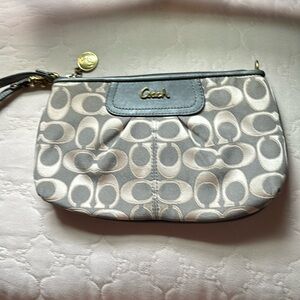 Small coach wristlet.